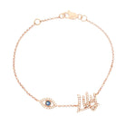Personalized Motif Diamond Script Nameplate Bracelet featuring an evil eye motif and elegant script lettering.