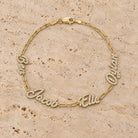 Personalized Multiple Script Diamond Nameplates Bracelet in 14K yellow gold, styled, Izakov Fine Jewelry