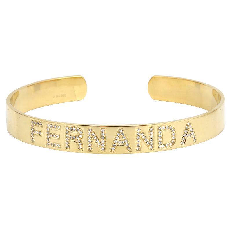 Gold personalized bracelet with "Fernanda" engraved in diamonds, elegant jewelry piece from our exclusive collection.