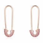 Elegant gold earrings with pink gemstones in a unique safety pin design from our exclusive jewelry collection.