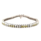 Elegant silver tennis bracelet with alternating yellow and white diamonds from our luxury jewelry collection