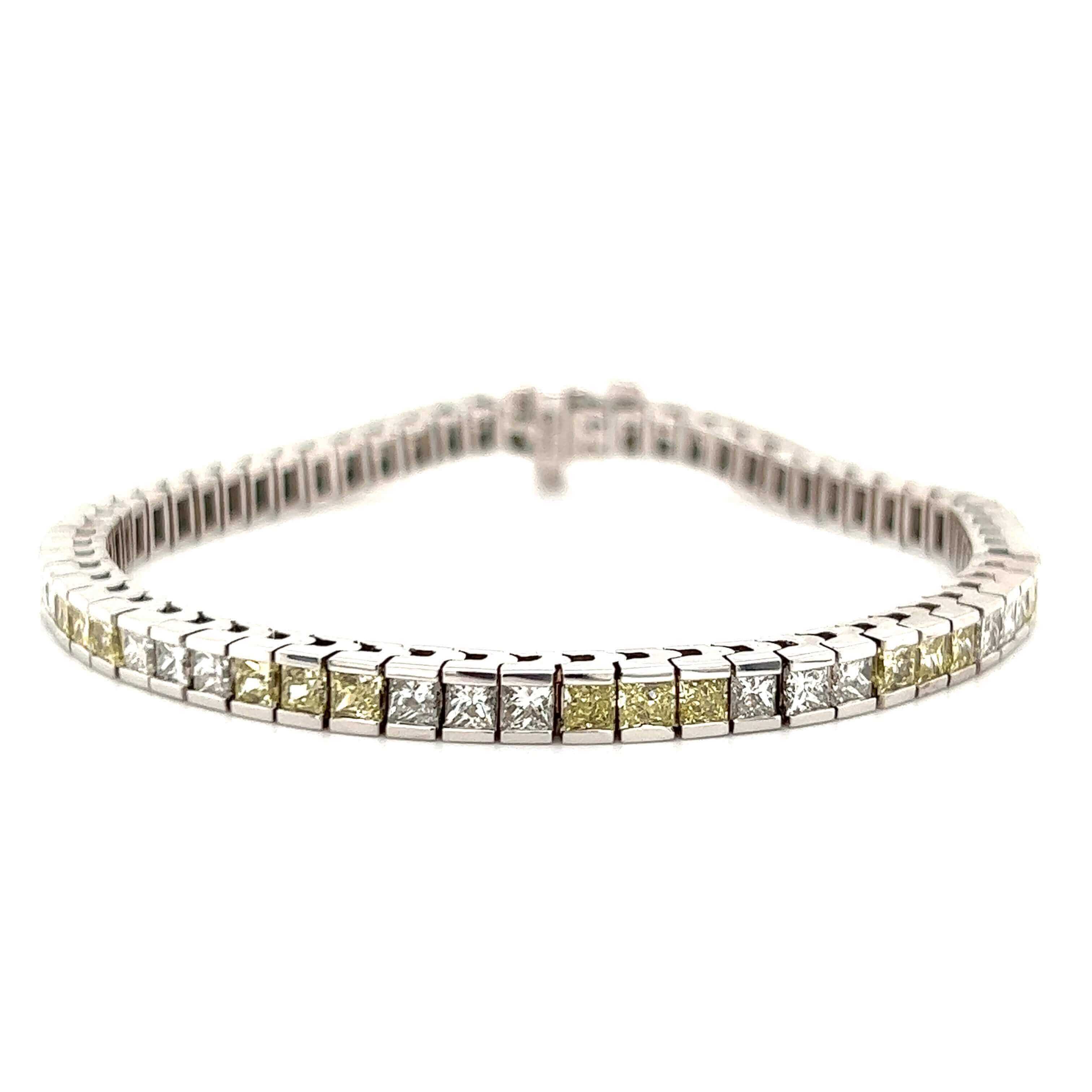 Elegant silver tennis bracelet with alternating yellow and white diamonds from our luxury jewelry collection