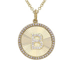 Gold diamond initial pendant necklace featuring a letter B on a radiant circular charm, perfect for personalized jewelry lovers