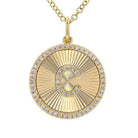 Gold pendant with engraved letter 'C' and diamond accents on chain necklace from our luxury jewelry collection.