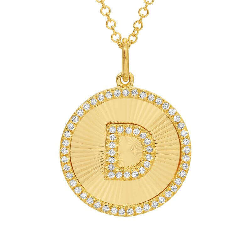 Gold round pendant necklace with diamond-embellished letter "D" by our jewelry brand.