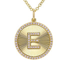 Gold initial pendant necklace with diamond-studded letter 'E' by our jewelry brand