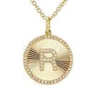 Gold initial 'R' pendant necklace with diamond accents set in our jewelry brand's elegant design.