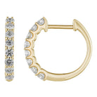 14K gold scalloped diamond hoop earrings featuring a 16mm diameter and 0.71ctw, elegant design for any jewelry collection.