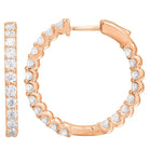 Rose gold hoop earrings with sparkling diamonds from our exquisite jewelry collection