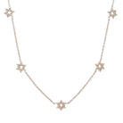 14K Gold Stars of David Station Necklace with five delicate Star of David charms on a fine gold chain, shown in all gold option.