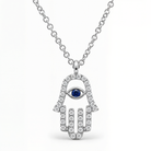 Pave Diamond Hamsa Necklace worn on hand