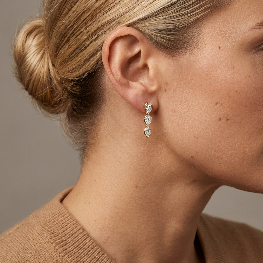Pear Lab Diamond Graduated Bezel Drop Earrings — model shot