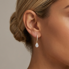 Round and Pear Lab Diamond Huggie Earrings — model shot