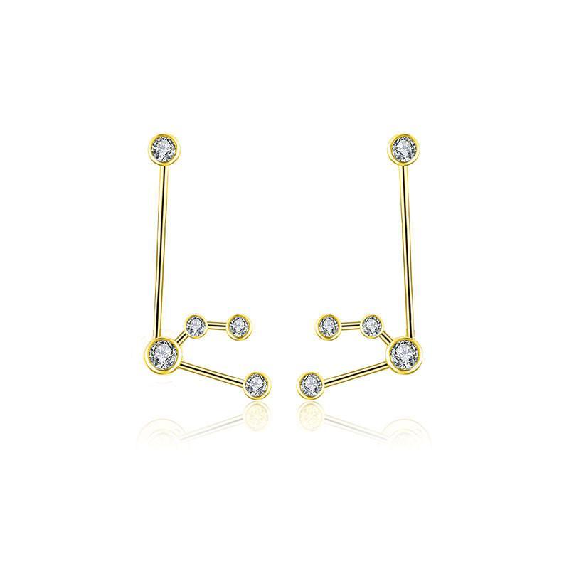 Gold constellation earrings with sparkling diamonds - luxury jewelry brand.