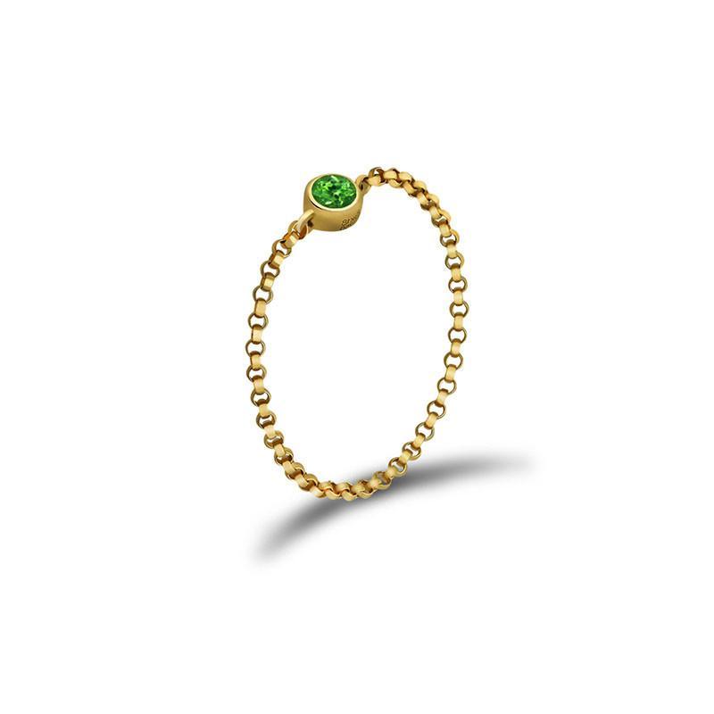 Delicate gold chain ring with green gemstone by luxury jewelry brand