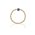 18K gold chain ring featuring a blue birthstone centerpiece, elegant and meaningful jewelry gift.