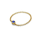 18K gold chain ring with blue birthstone, a perfect blend of elegance and personal significance.