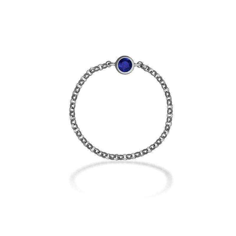 18K gold birthstone chain ring featuring a blue gemstone, perfect for elegant accessories and meaningful gifts.