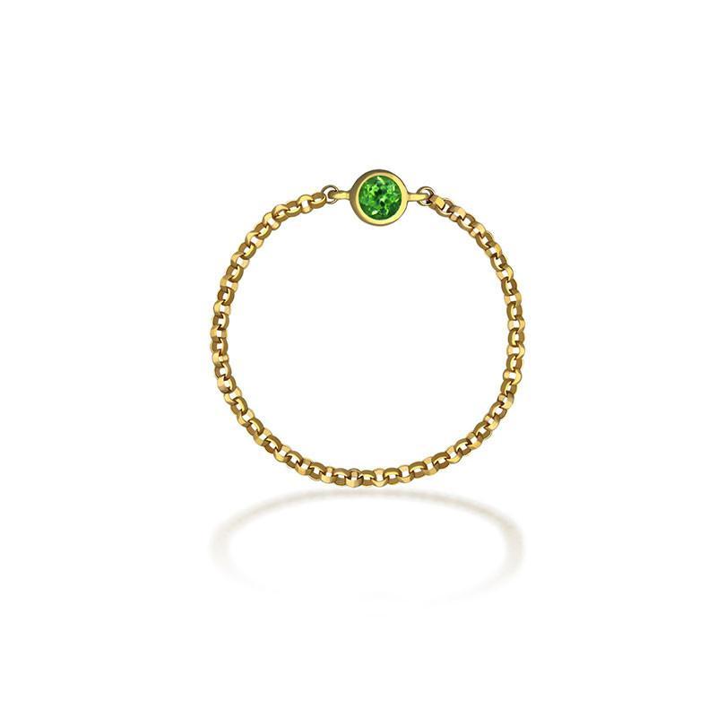 18K gold chain ring featuring a vibrant green birthstone, perfect for personal significance and elegant jewelry collections.