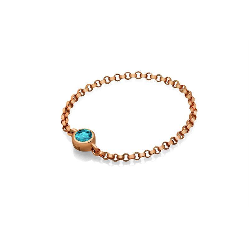 18K gold chain ring with turquoise birthstone, a stylish and meaningful accessory for personal expression.