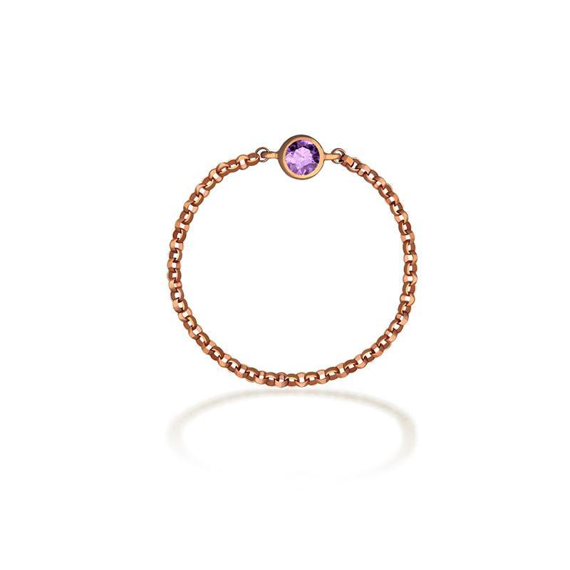 18K gold chain ring with a purple birthstone, elegant and timeless jewelry piece for personal significance and meaningful gifts.