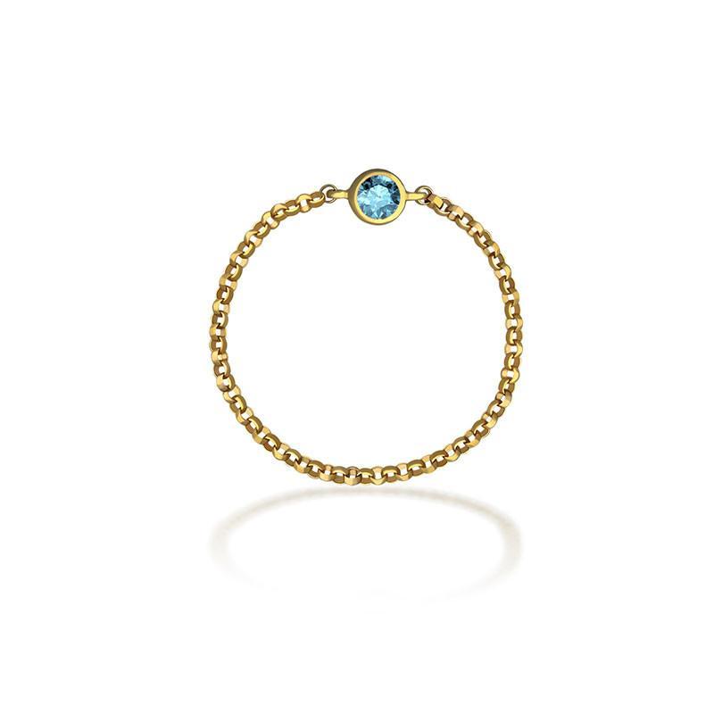 18K gold birthstone chain ring featuring a vibrant blue gemstone, perfect for personalized gifting and elegant style.