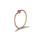 18K gold chain ring featuring a purple birthstone, a perfect blend of elegance and personal significance.