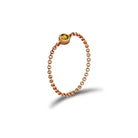 18K gold chain ring with yellow birthstone, elegant and meaningful accessory for personal significance and gifts.