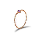 18K gold chain ring featuring a stunning purple birthstone, an elegant and meaningful accessory for any occasion.