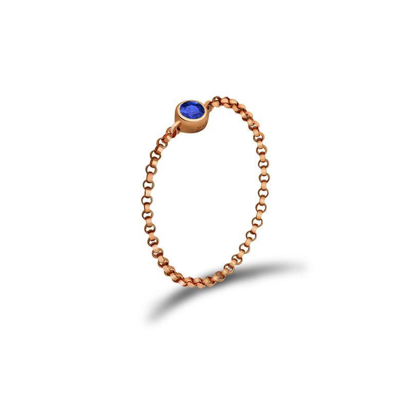 18K gold chain ring featuring a stunning blue birthstone, perfect for personal significance and elegant gifts.