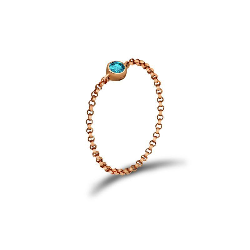 18K gold chain ring featuring a blue birthstone, elegant timeless accessory and meaningful gift.