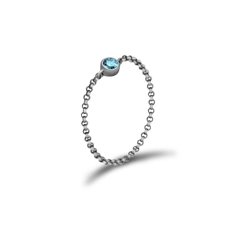 18K gold chain ring featuring a blue birthstone, elegant design, perfect for personal significance and meaningful gifts.