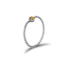 18K gold chain ring featuring a vibrant yellow birthstone, perfect for personal significance and elegant gifting.