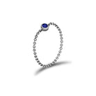 18K gold chain ring featuring a blue birthstone, perfect for personal significance and elegant jewelry collection.