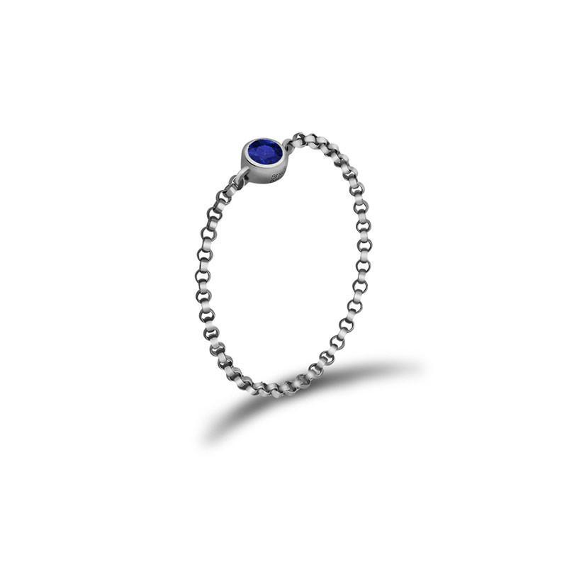 18K gold chain ring featuring a blue birthstone, perfect for personal significance and elegant jewelry collection.