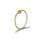 18K gold chain ring featuring a unique birthstone, elegantly crafted for a timeless accessory or meaningful gift.