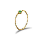 18K gold chain ring featuring a green birthstone, perfect for elegant jewelry collections and meaningful gifts.