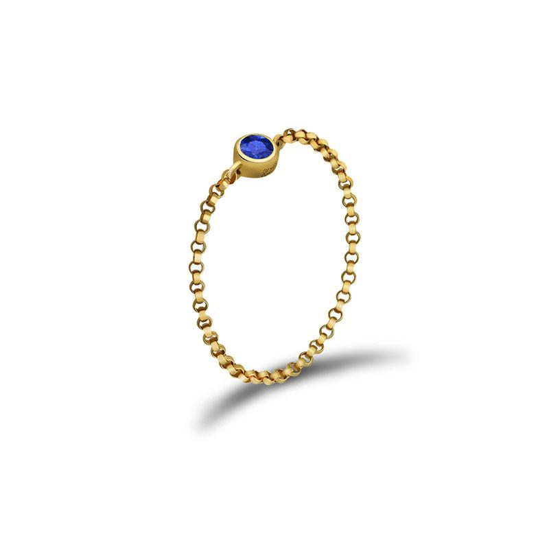 18K gold chain ring featuring a blue birthstone, perfect for personal significance and elegant jewelry collections.