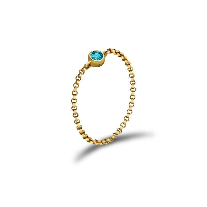 18K gold birthstone chain ring with a blue gemstone, elegant jewelry gift for special occasions.