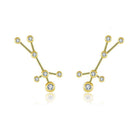 Gold constellation earrings with sparkling gemstones from our jewelry collection.