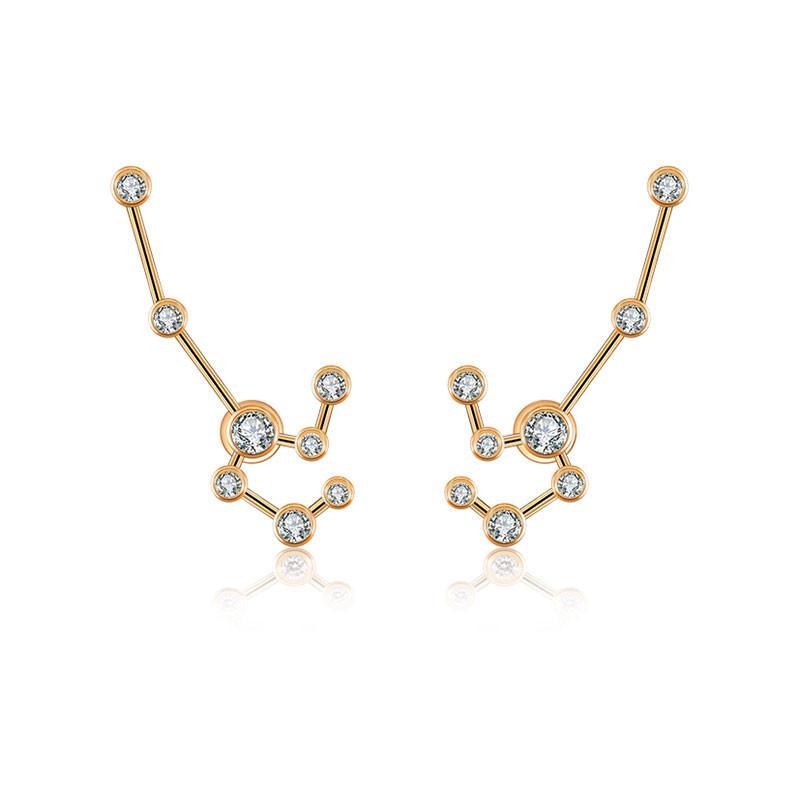 Gold constellation earrings with sparkling diamonds from our luxury jewelry brand.