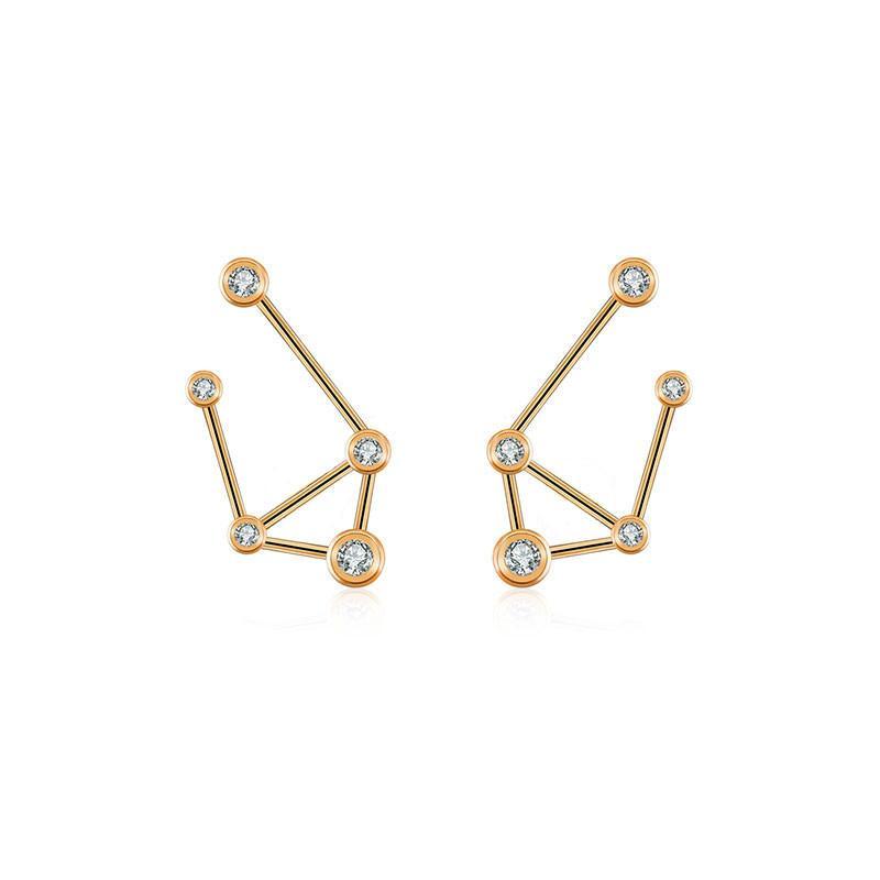 Gold constellation earrings with sparkling gemstones, elegant jewelry design from our exclusive collection