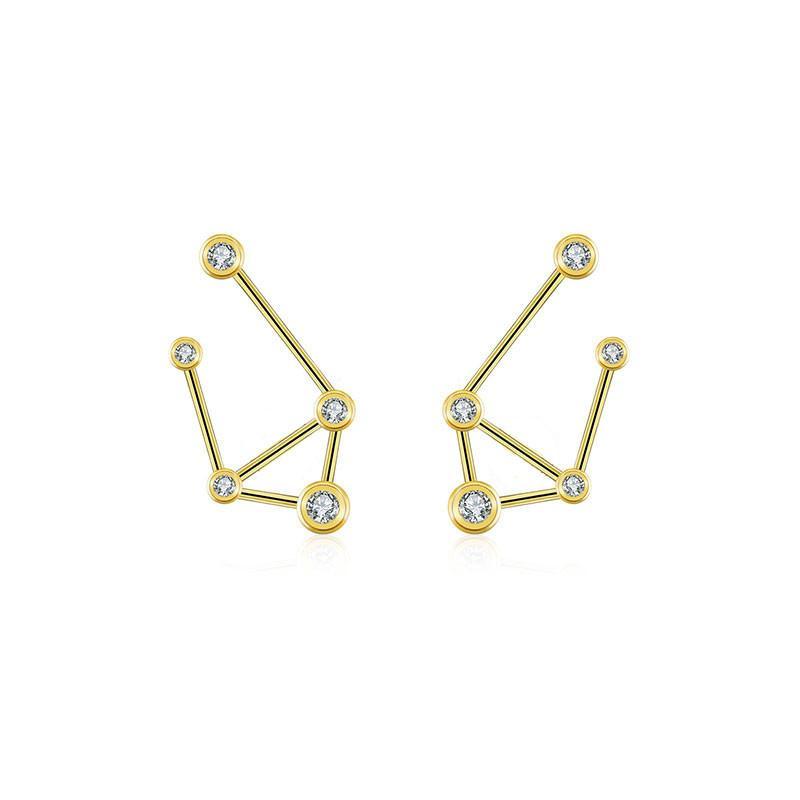 Gold constellation earrings with sparkling gemstones from our exclusive jewelry collection.