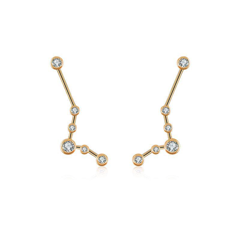 Gold constellation earrings with sparkling diamonds – celestial jewelry piece from our exclusive collection.