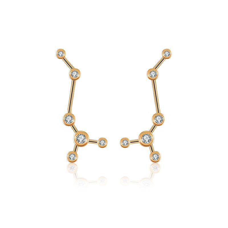 Gold constellation earrings with diamonds from our exclusive jewelry collection.