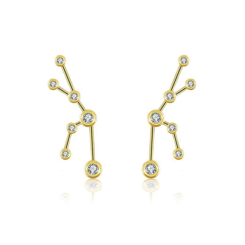 Elegant gold constellation earrings with sparkling diamonds - star-shaped jewelry from our celestial collection.