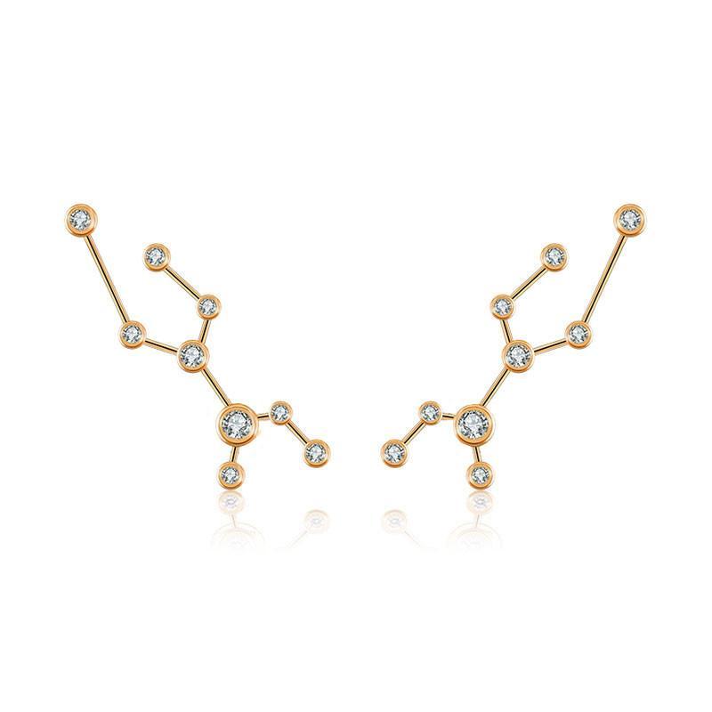 Gold constellation earrings with sparkling diamond accents from our exclusive jewelry collection