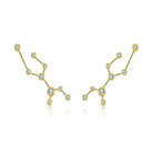 Gold constellation earrings with sparkling embedded gems from our exclusive jewelry collection