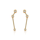 18K gold zodiac constellation diamond earrings showcasing elegant celestial designs and sparkling diamonds.