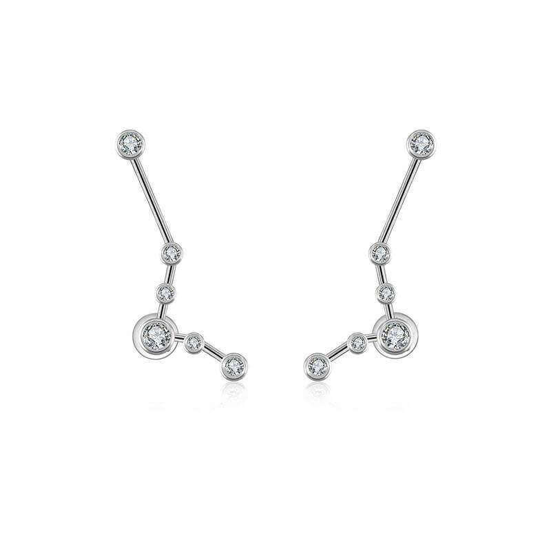 Exquisite white gold zodiac constellation diamond earrings showcasing elegant celestial designs.